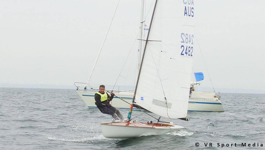 Jason Beebe crossing the finish line at the 2017 Contender worlds in Sønderborg. VR Sport Media © C-Tech www.c-tech.co.nz